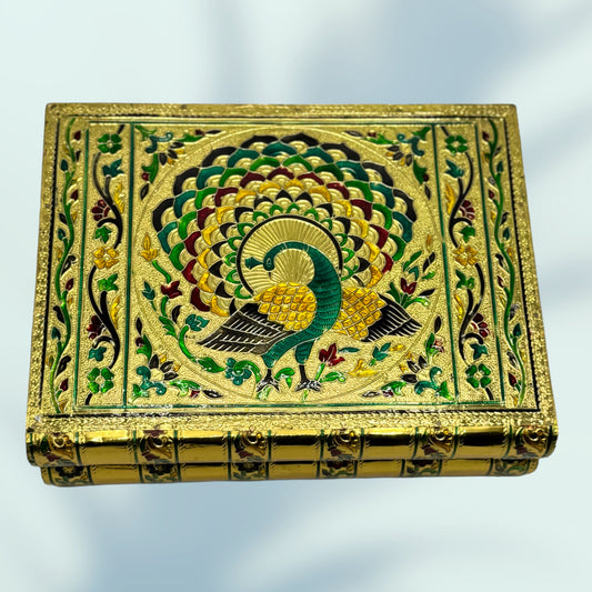 top and side view of the regal peacock meenakari jewelry box is shown in this image. 
