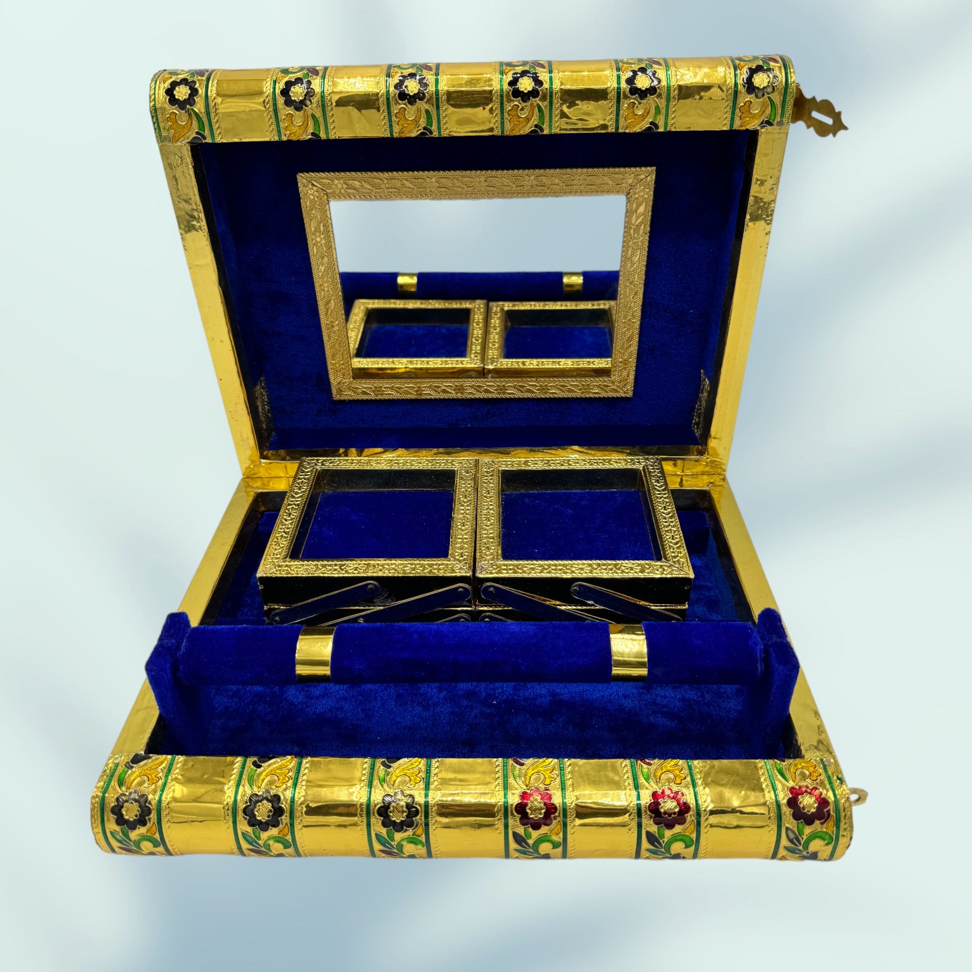 open peacock jewelry box with the dowel in place and the trays folded down. there is a framed mirror and a latch seen on the top 
