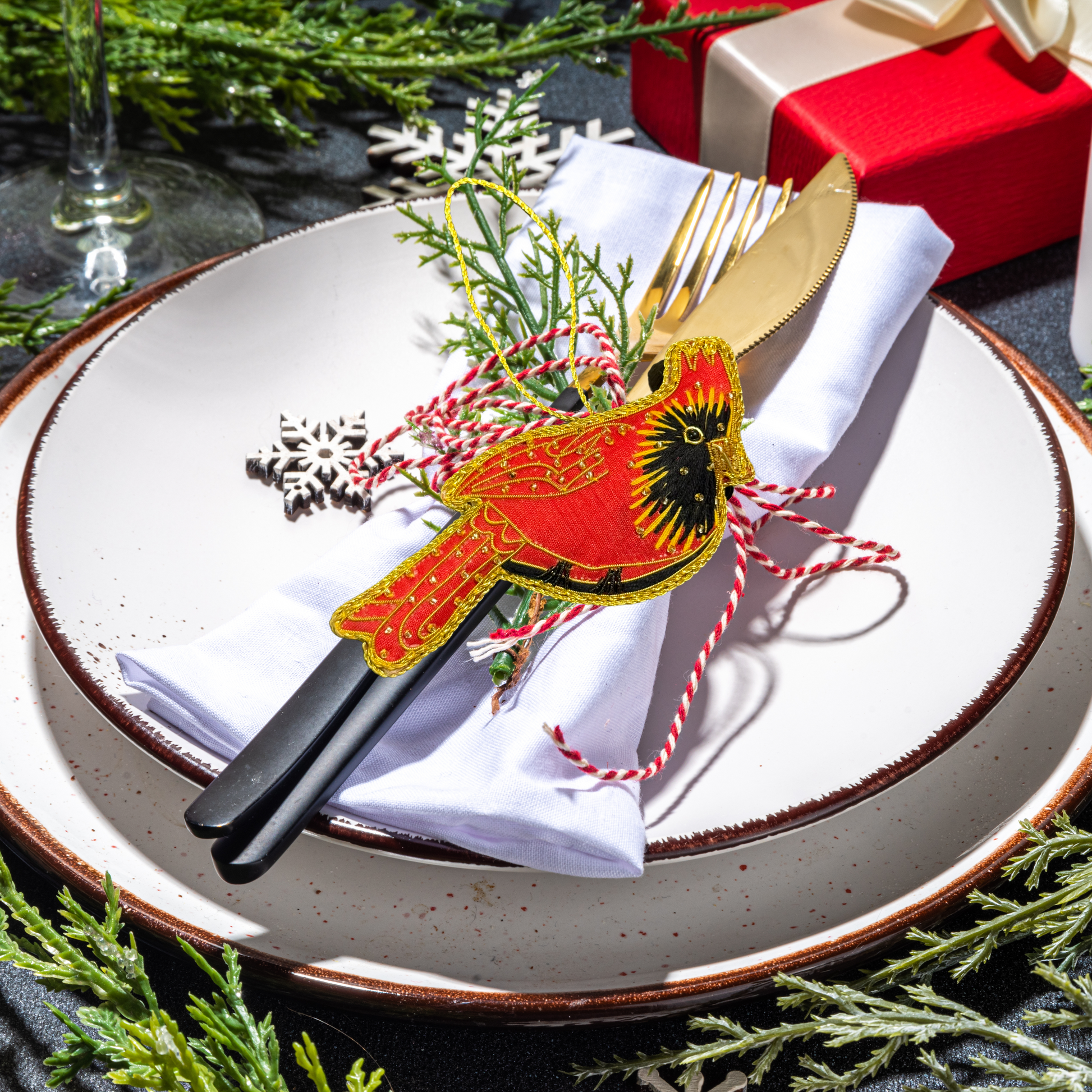 Red Cardinal with Zari Embroidery as a holiday dinner place holder 