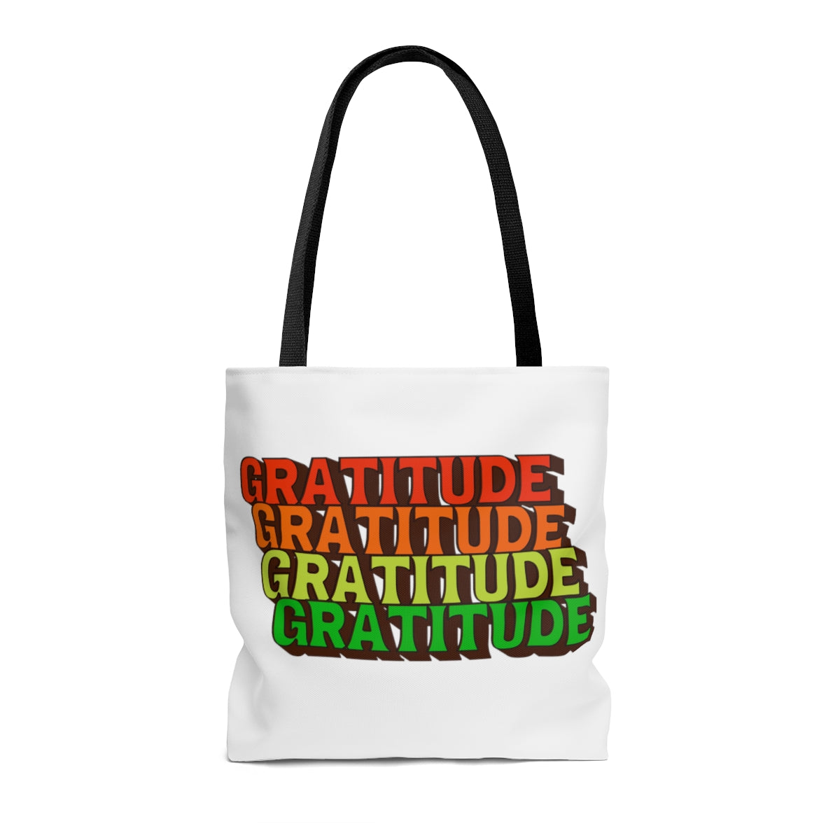 white tote bag with gratitude printed in bold colorful letters 