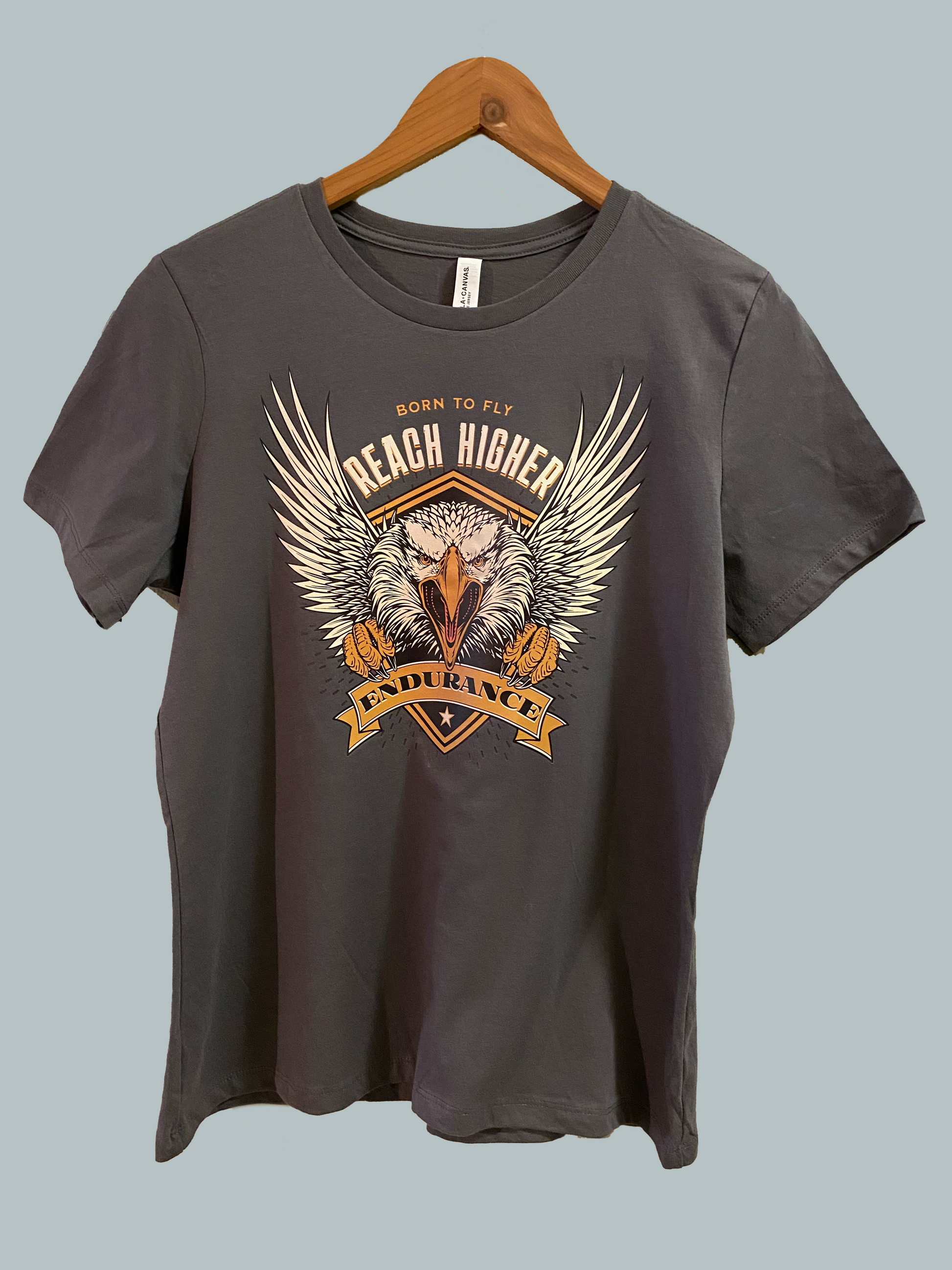 Grey version of Eagle design which reads Born To Fly Reach Higher on the top of the eagle and Endurance below it