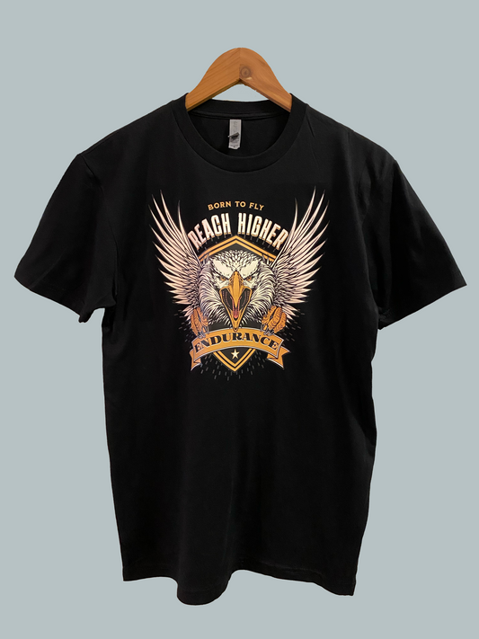 Large eagle with Born To Fly Reach Higher and Endurance written around the image of the eagle. This is a black unisex t-shirt